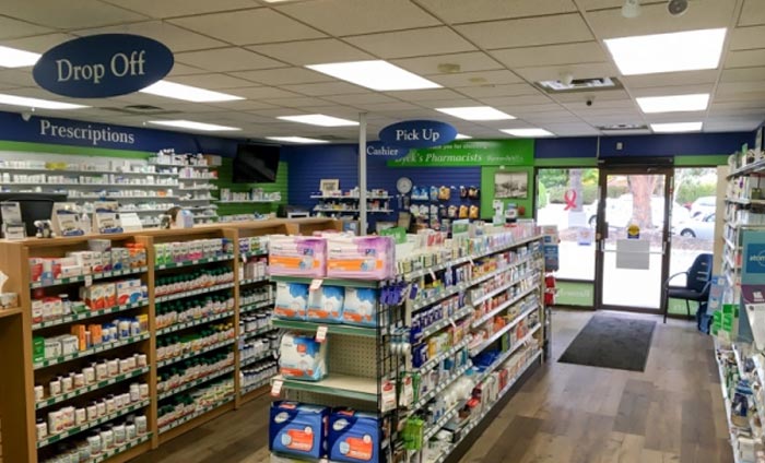 aisles filled with products in a pharmacy store