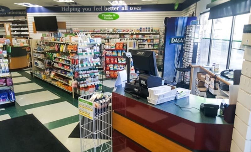 aisles filled with products in a pharmacy store