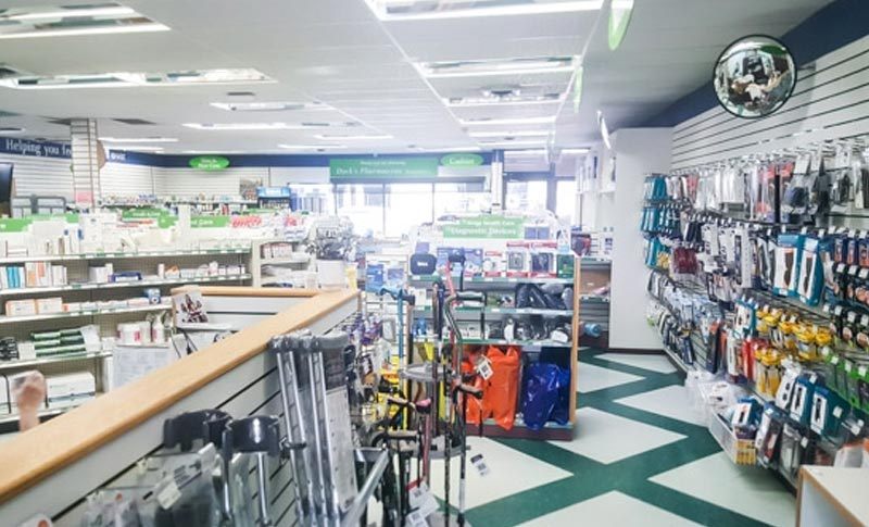 aisles filled with products in a pharmacy store